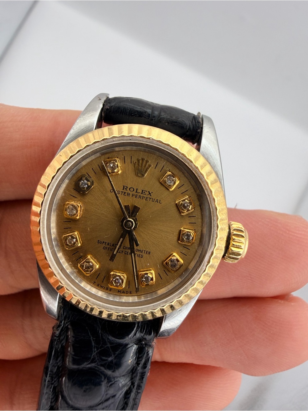 Rolex Ladies Two-Tone Gold Dial Diamond Accent Watch with Black Strap